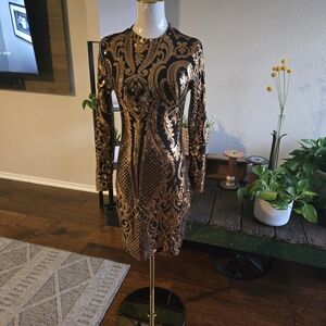 Elegant Black and Gold Sequin Dress